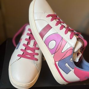 Woman’s coach sneakers size 10, in amazing condition!